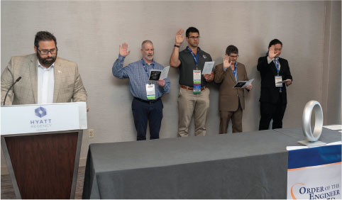 DAVID JANOVER, P.E., F.NSPE, INDUCTS MEMBERS DURING THE ORDER OF THE ENGINEER CEREMONY